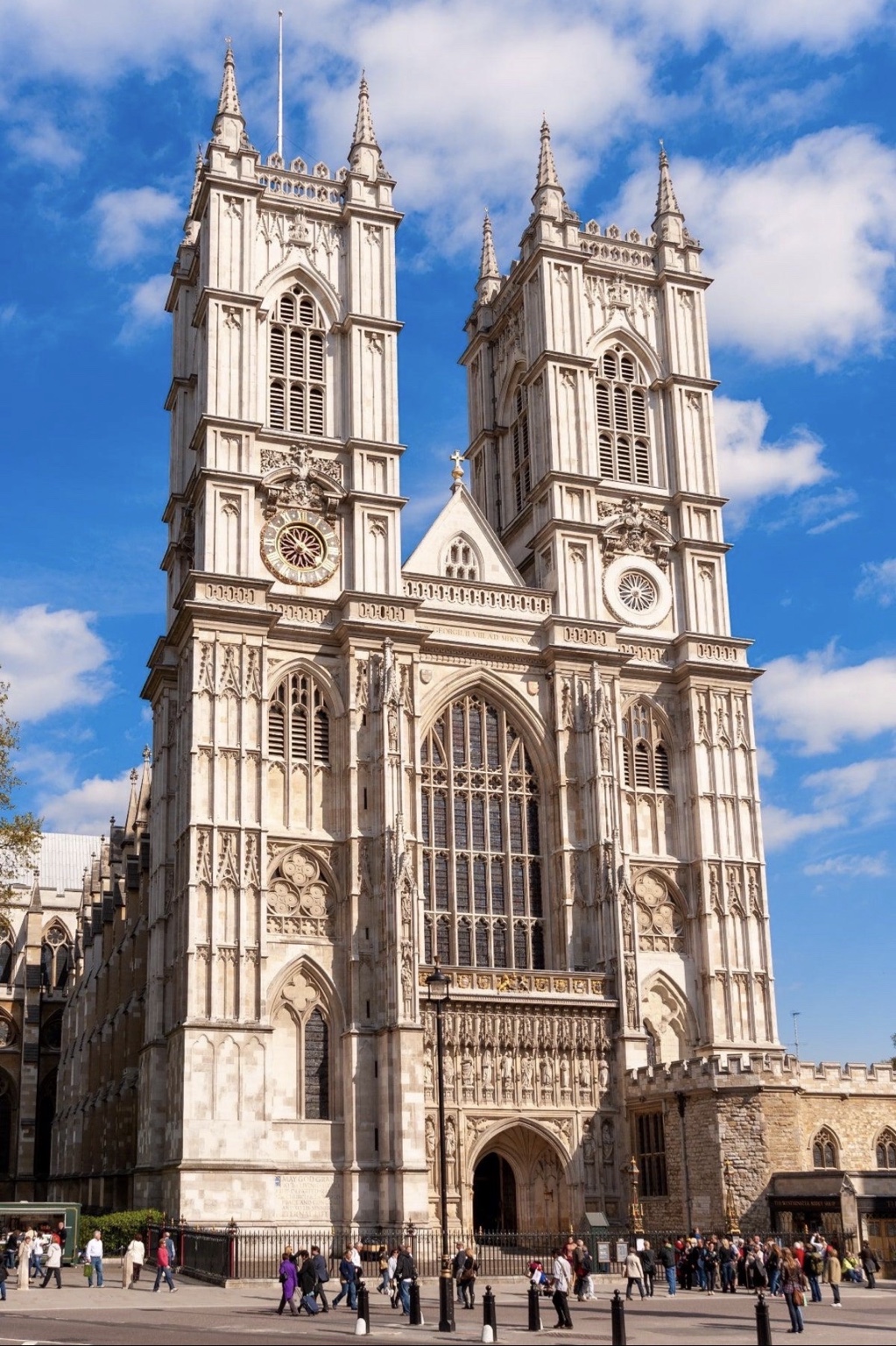 Full view of Westminster Abbey beneath a blue sky